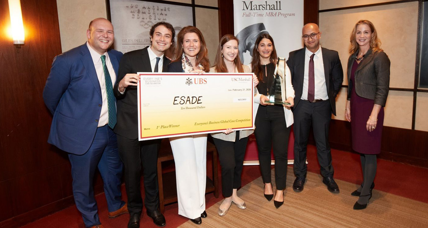 USC Marshall School of Business in California giving Esade students a large check