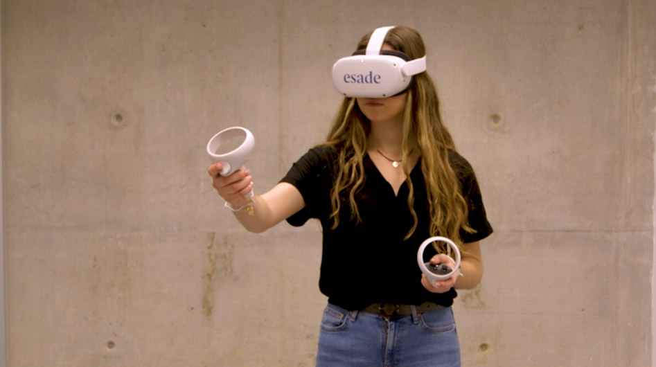 Woman virtual reality goggles inside Esade metaverse