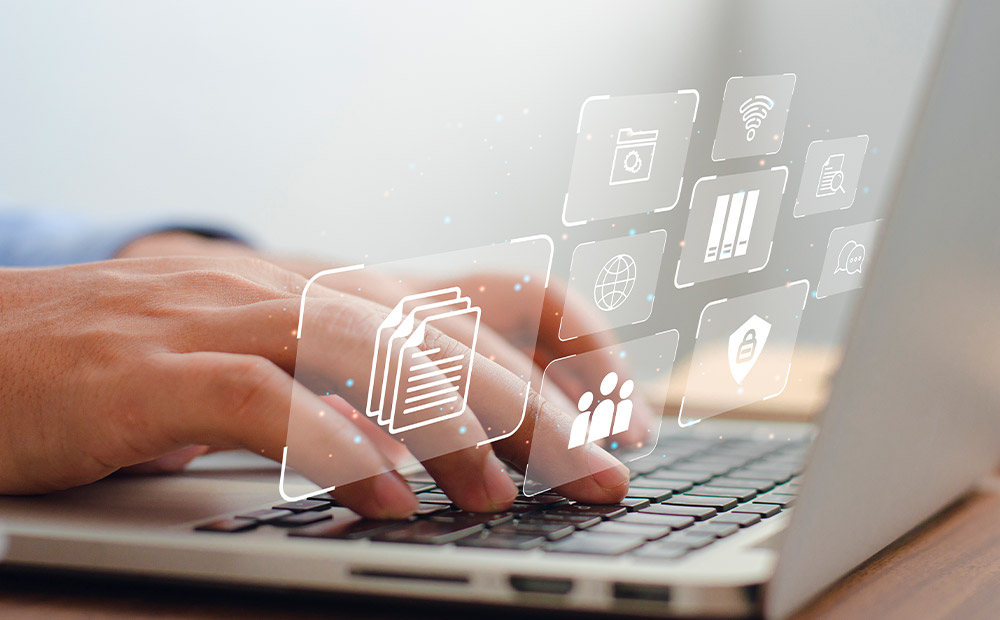 Person typing computer icons digital tools