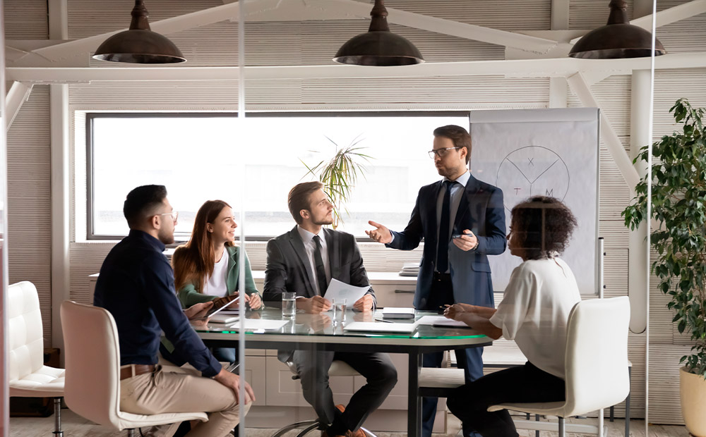 Sports club executive team meeting in the boardroom.